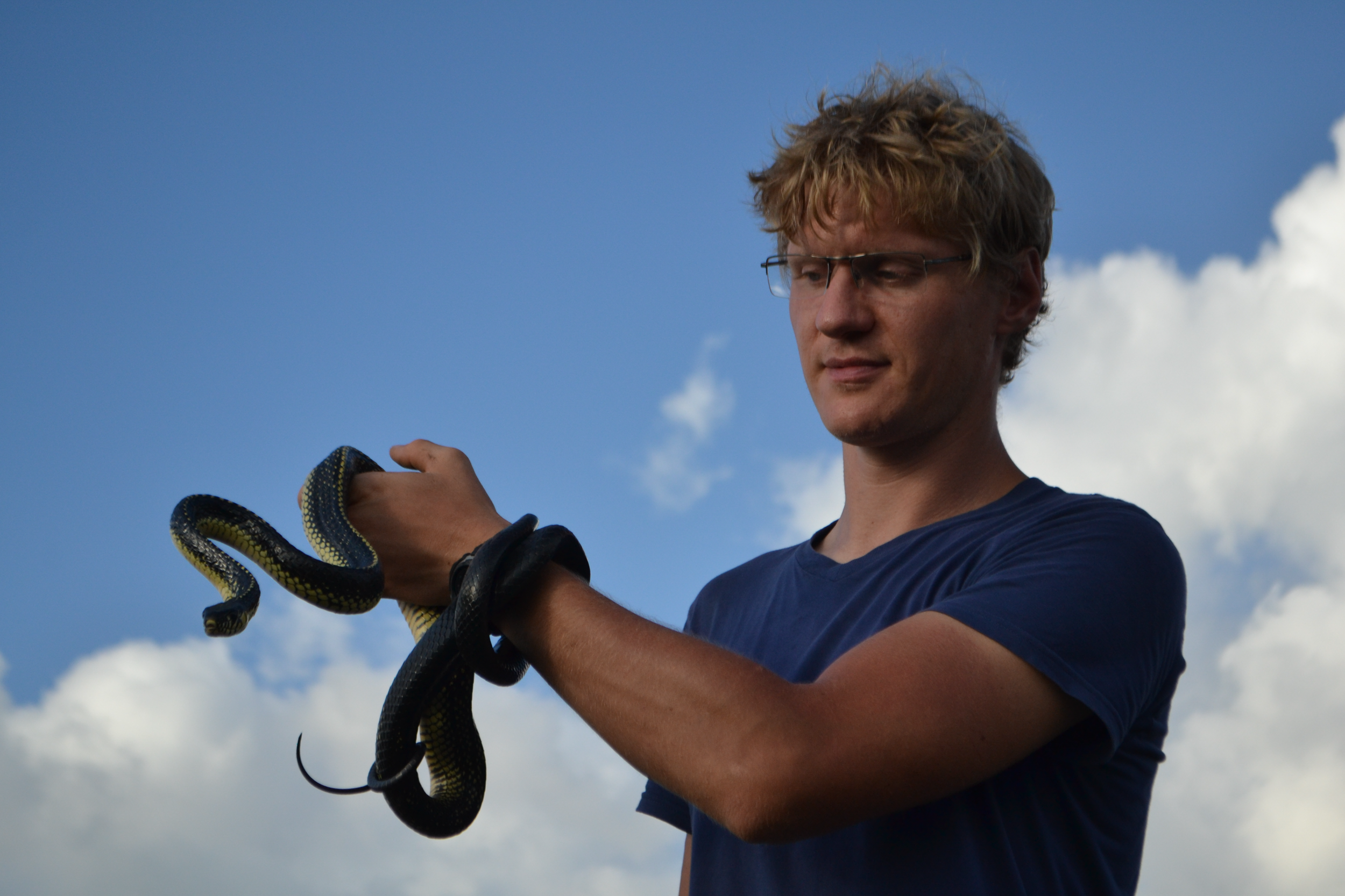 Man holding snake